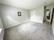 Light-filled bedroom with closet and hallway access at 11821 Bills Ave, Fishers, IN 46037