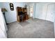 Bedroom boasts natural light, new carpet, and attached study or extra closet space at 11821 Bills Ave, Fishers, IN 46037