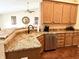Granite countertops and light-colored cabinetry in an open kitchen layout at 11821 Bills Ave, Fishers, IN 46037