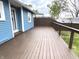 A light brown back deck on a blue house at 125 Howard St, Greenfield, IN 46140