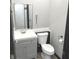 Bathroom featuring a modern vanity with storage and toilet at 125 Howard St, Greenfield, IN 46140