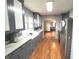 Charming kitchen with stainless steel appliances and ample counter space for food preparation at 125 Howard St, Greenfield, IN 46140