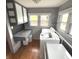 Functional laundry room with plenty of natural light and built-in countertop at 125 Howard St, Greenfield, IN 46140
