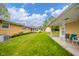 Well-maintained backyard with a patio and beautiful landscaping at 1324 Chesterfield Dr, Anderson, IN 46012