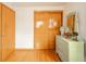 Bedroom featuring wooden floor, dresser and closet at 1324 Chesterfield Dr, Anderson, IN 46012
