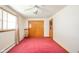 Bedroom featuring large windows, neutral walls, closet and carpet flooring at 1324 Chesterfield Dr, Anderson, IN 46012