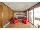 A living room with a fireplace and sliding glass door at 1324 Chesterfield Dr, Anderson, IN 46012