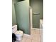 This bathroom features a shower, toilet and laundry at 1328 Sturm Ave, Indianapolis, IN 46202