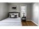 Bedroom featuring a Queen bed, hardwood floors, neutral walls and bright, natural light at 139 N East St, Pendleton, IN 46064