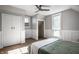 Bright bedroom with hardwood floors, ceiling fan, closet, and natural light from two windows at 139 N East St, Pendleton, IN 46064