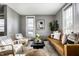 Bright living room featuring modern furnishings, natural light, and stylish decor at 139 N East St, Pendleton, IN 46064
