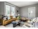 Comfortable living room with stylish decor, neutral walls, and bright natural light at 139 N East St, Pendleton, IN 46064