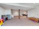 Open basement layout with dedicated play areas, perfect for and Gathering activities at 1421 Stoney Creek Cir, Carmel, IN 46032