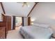 Spacious bedroom featuring a comfortable bed and access to an en-suite bathroom at 1421 Stoney Creek Cir, Carmel, IN 46032