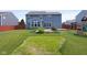 Expansive backyard features a lush lawn and a playset at 14584 Hinton Dr, Fishers, IN 46037