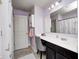 Elegant bathroom with a vanity area, neutral walls, and a shower with butterfly decorated curtain at 14584 Hinton Dr, Fishers, IN 46037