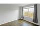 Bedroom showcases wood laminate flooring and natural light from the window at 14584 Hinton Dr, Fishers, IN 46037