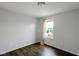 Neutral bedroom with a window and wood floors at 14584 Hinton Dr, Fishers, IN 46037