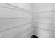 Walk-in closet with multiple wire shelving units for optimal storage capacity at 14584 Hinton Dr, Fishers, IN 46037
