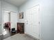Inviting entryway featuring a coat closet and adjacent sitting room at 14584 Hinton Dr, Fishers, IN 46037