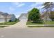 Charming two-story home featuring a two-car garage, well-manicured lawn, and mature landscaping at 14584 Hinton Dr, Fishers, IN 46037