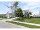 Lovely two-story home with a well-maintained lawn, mature trees, and a two-car garage at 14584 Hinton Dr, Fishers, IN 46037