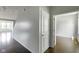 Hallway with hardwood floors leading to a bedroom at 14584 Hinton Dr, Fishers, IN 46037