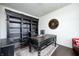 Sophisticated home office with custom built-in bookcase and executive desk at 14584 Hinton Dr, Fishers, IN 46037