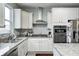 Modern kitchen showcases stainless steel appliances and granite countertops at 14584 Hinton Dr, Fishers, IN 46037