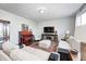 Large living room with lots of seating and large entertainment center at 14584 Hinton Dr, Fishers, IN 46037