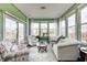 Bright living room with large windows, comfortable seating, and stylish decor at 14584 Hinton Dr, Fishers, IN 46037