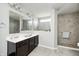 This primary bathroom boasts a double sink vanity and walk-in shower, designed for a luxurious and relaxing experience at 14584 Hinton Dr, Fishers, IN 46037