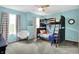 Cheerful bedroom with bunk beds, bright blue walls, and a cozy seating area at 14817 Deerwood Dr, Carmel, IN 46033