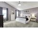 Stylish main bedroom featuring elegant decor, including a crystal chandelier at 14817 Deerwood Dr, Carmel, IN 46033