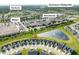 Aerial view of homes with a pond in the Millers Walk neighborhood near Noblesville shopping at 17023 Adler Ln, Noblesville, IN 46060