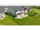 Large backyard with well-kept lawn, patio, and pergola, offering a relaxing outdoor space at 17023 Adler Ln, Noblesville, IN 46060
