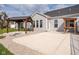 Backyard featuring a concrete patio, wooden pergolas, green grass, and privacy fence at 17023 Adler Ln, Noblesville, IN 46060