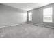 Bedroom with carpet and two windows at 17023 Adler Ln, Noblesville, IN 46060