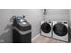 Laundry room features new washer and dryer, water softener system, and shelving at 17023 Adler Ln, Noblesville, IN 46060