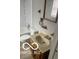 A bathroom with a toilet, sink, shower, and bathtub at 1710 S Birch St, Muncie, IN 47302