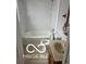 A bathroom with a toilet, sink, shower, and bathtub at 1710 S Birch St, Muncie, IN 47302