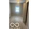 A bedroom featuring vinyl flooring and a window at 1710 S Birch St, Muncie, IN 47302