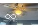 This bedroom features a ceiling fan with light fixture for enhanced comfort and illumination at 1710 S Birch St, Muncie, IN 47302