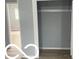 A small walk-in closet at 1710 S Birch St, Muncie, IN 47302