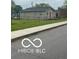 Cozy single-story home with a fenced yard and sidewalk access at 1710 S Birch St, Muncie, IN 47302