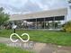 Community playground featuring an open picnic table area with mature green grass lawn at 1710 S Birch St, Muncie, IN 47302