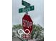 Image of street sign: W 10th St, S Birch Street with stop sign at 1710 S Birch St, Muncie, IN 47302
