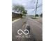 Street view of the neighborhood on a cloudy day showing telephone poles and sidewalks at 1710 S Birch St, Muncie, IN 47302
