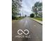 Street view of the neighborhood on a cloudy day with sidewalks and nearby homes at 1710 S Birch St, Muncie, IN 47302
