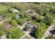 An aerial shot of the property showing the home nestled among lush greenery at 1715 Haynes Ave, Indianapolis, IN 46240